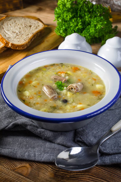 istock Polish barley soup with vegetables and chicken heart. 1213753337