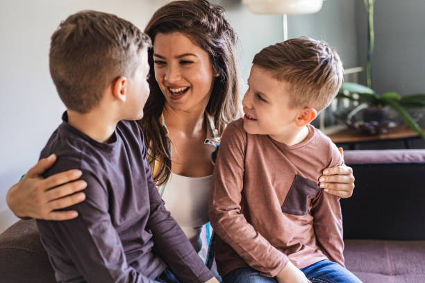 istock Portrait of mother with her two son 1213755647