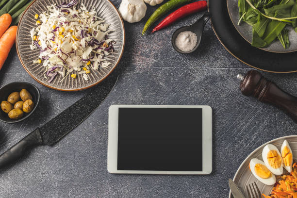 istock Digital tablet and vegan food 1213759614