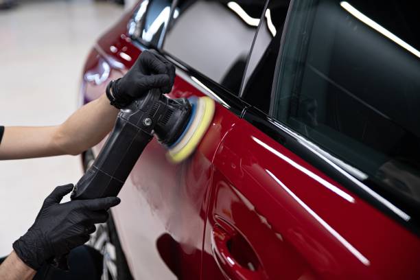 istock Man polishing car paint 1213761998