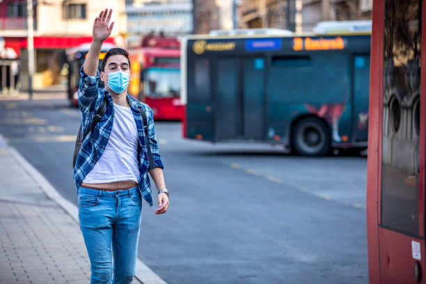 istock Young casual Men with backpack Running To Catch Bus Stop during 1213763415