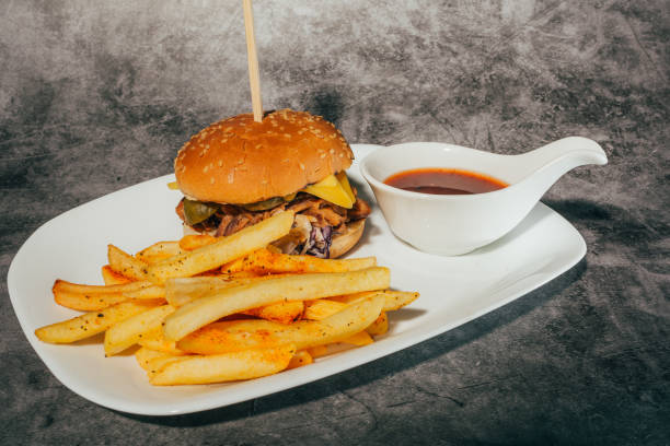 istock a hamburger with french fries 1213763652