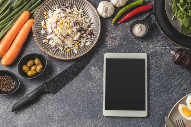istock Digital tablet and vegan food 1213765500
