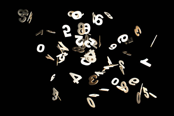 Real Wood Numbers Flying away Isolated on Black Background stock photo