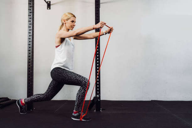 istock Fit blonde woman doing leg exercise 1213768798