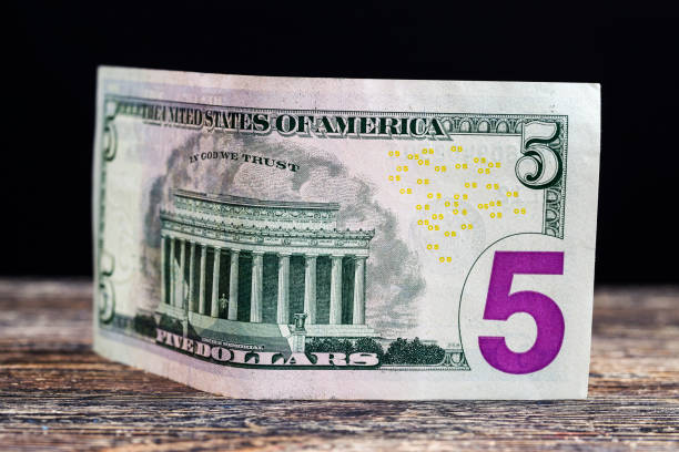 istock five American dollars in cash 1213772316