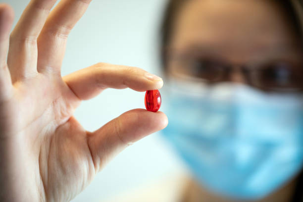 istock Doctor holding a pill 1213774138