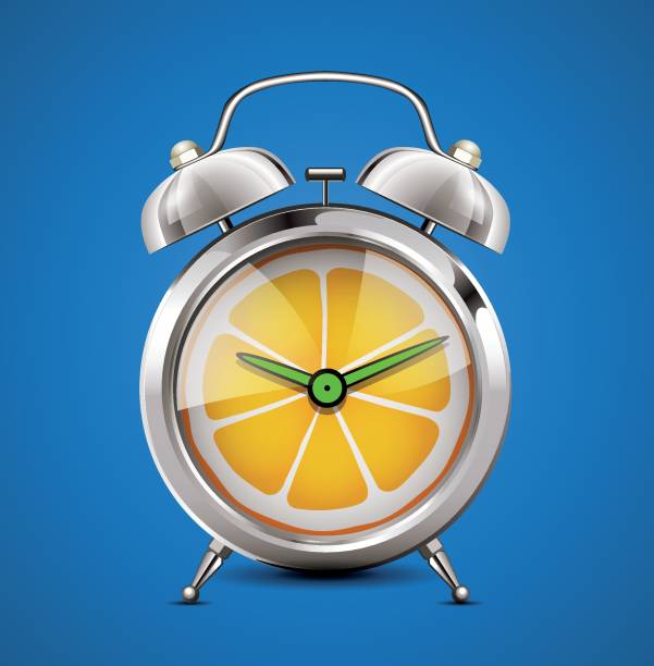 istock Time for vitamins - citrus fruit as a clock - 
Vitamin C for body immunity concept 1213774217