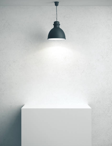 istock Blank concrete wall, podium and lamp. 1213777279