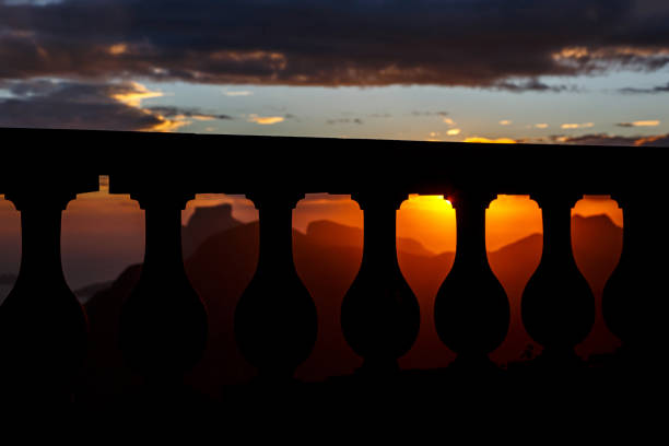 Black silhouette of Balustrade on sunset and mountain line backgound.