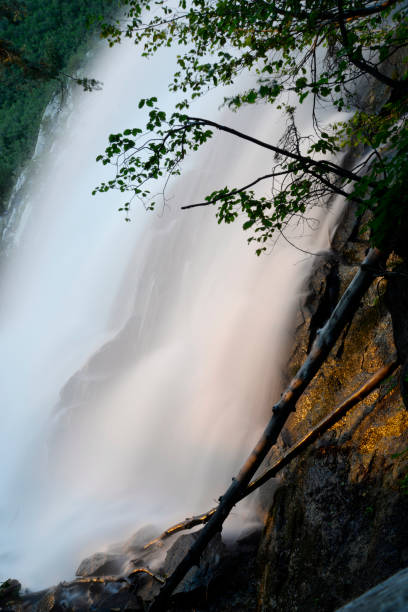 istock Sunset light bathes rock beside waterfall in Bells Canyon, Utah. 1213777482