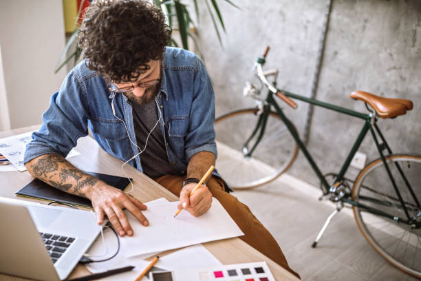 istock Digital Artist Working At Home 1213779705