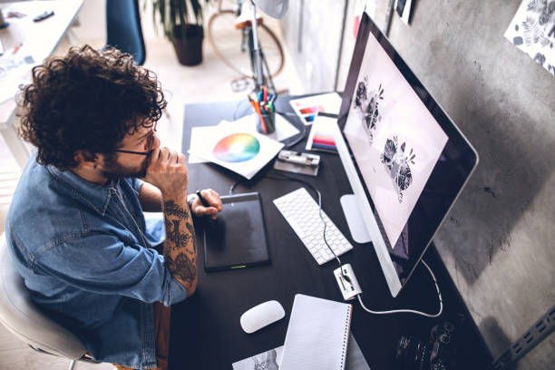 istock Digital Artist Working At Home 1213780653