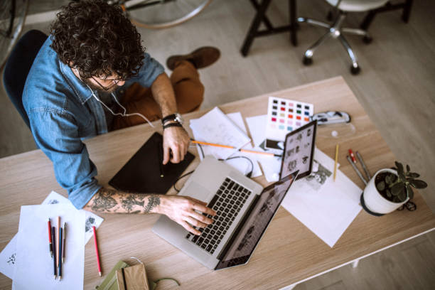 istock Digital Artist Working At Home 1213781494