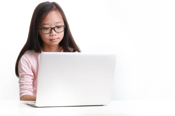 istock Young Asian girl using laptop 1213781594