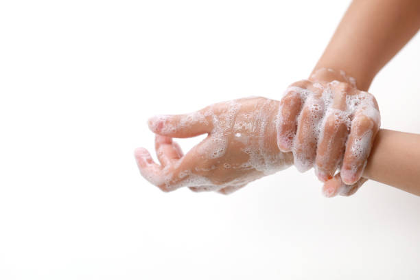 istock Young Adult Washing Hands With Soap 1213781639