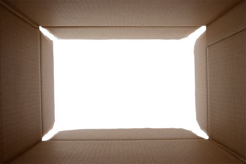 A view from inside a cardboard box isolated on white background with clipping path. 