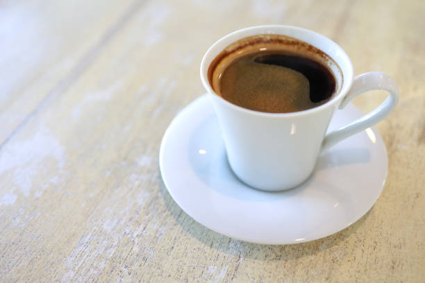 istock Coffee Cup On Wooden Background 1213783218