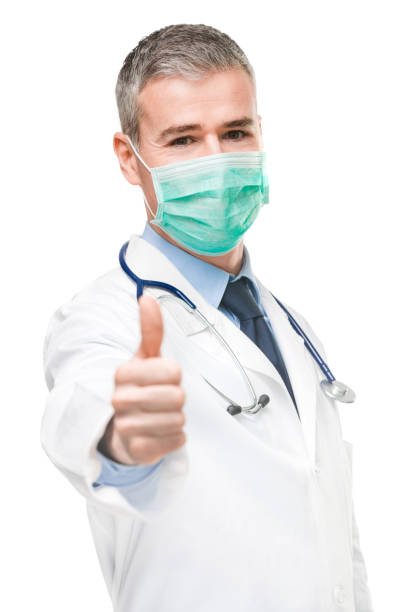 istock Doctor wearing a surgical face mask 1213783742