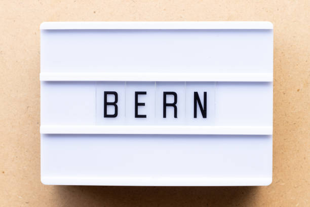 istock Lightbox with word Bern on wood background 1213785426