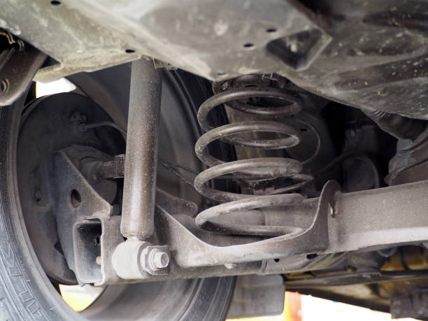 istock Dirty Car Shock Absorber and Spring. 1213787899