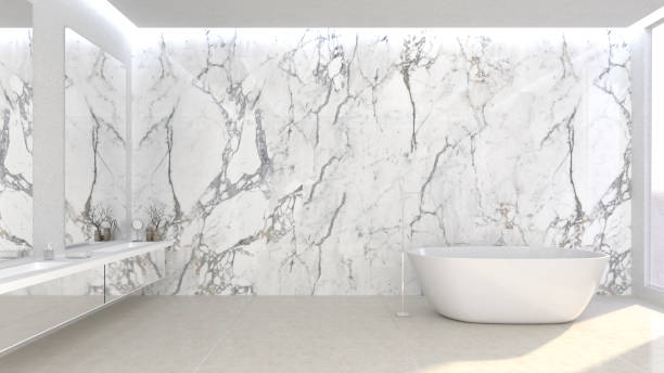 istock Bathroom modern interior.3d  rendering.minimal room design concept.marble stone floor and bathtub decoration.Luxury bathroom interior with white marble walls and a long counter. 1213791865