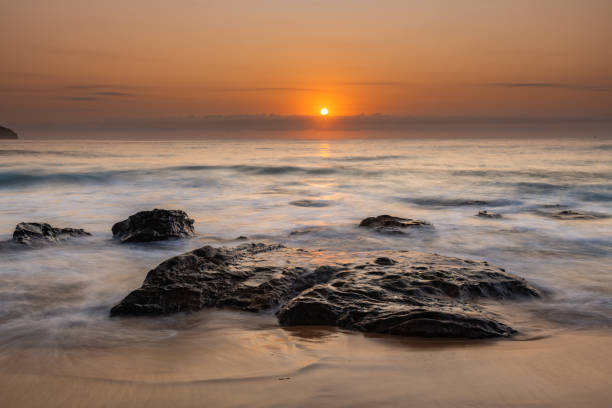 istock Pretty Pastel Summer Sunrise by the Sea 1213796521