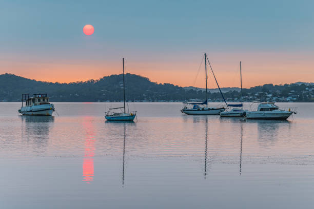 istock A Blanketed Sky, Boats and Reflections on the Bay 1213796593