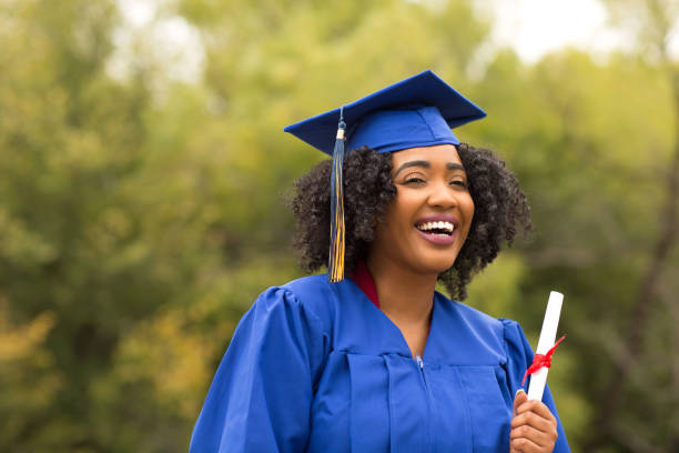 istock Excited young woman on graduation day. 1213801615