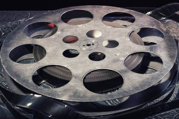istock 35 mm film reel with dramatic lighting on a dark background 1213812813
