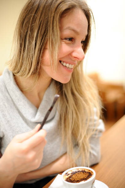istock Young woman at the cafe 121382446