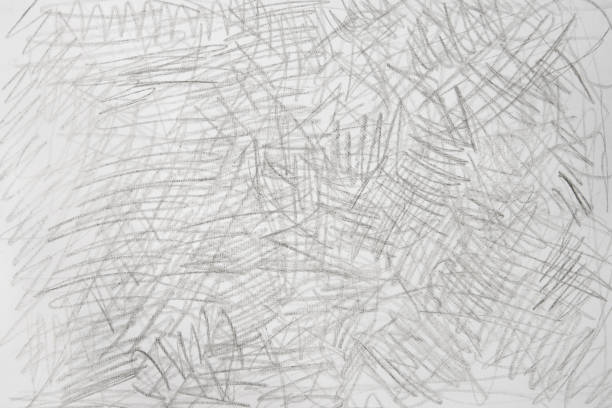 istock gray crayon doodles on paper background texture 1213830492