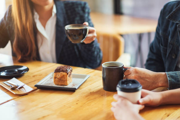 istock people enjoyed talking, eating and drinking coffee together in cafe 1213831479