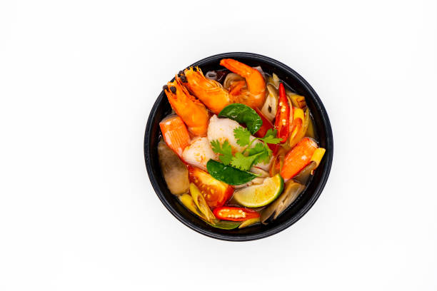 istock Prawn Tom Yum, Thai hot spicy soup on white background 1213835719