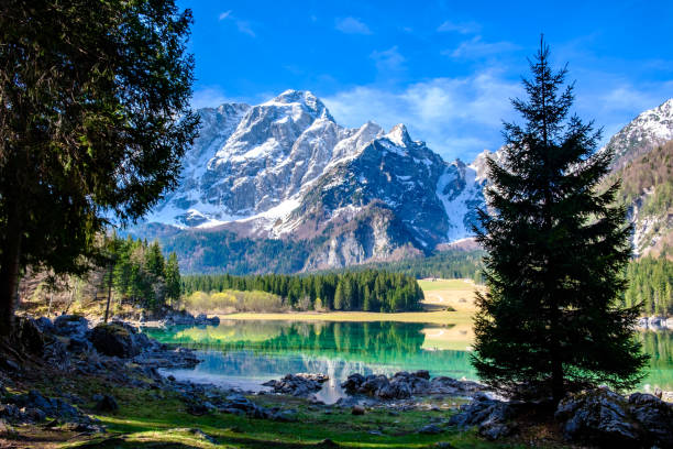 istock Spring morning at the alpine lake 1213839159