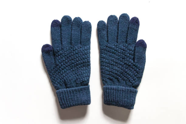 guanti touch screen in maglia blu scuro isolati su sfondo bianco. - glove winter wool touching foto e immagini stock