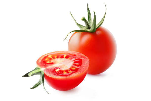 Tomatoes isolated on white background. Whole and cut fresh, red tomatoes with green steam isolated on white background. cherry tomato stock pictures, royalty-free photos & images