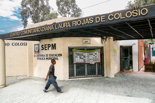 Tijuana, Mexico, March 19 - A man walks in front of the community center in the square of Unity and Hope erected in the place where the presidential candidate Luis Donaldo Colosio Murrieta was assassinated on 24 March 1994 during an electoral meeting, in the district of Lomas Taurinas, close to the border line between Mexico and the United States, in the northern sector of Tijuana.