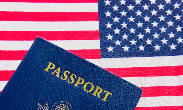 istock American flag and passport. 1213848154