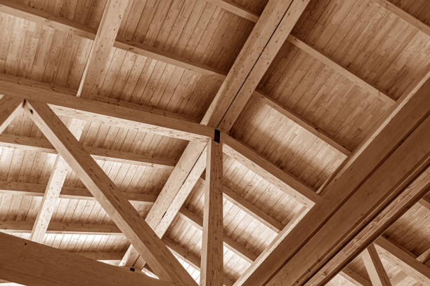 istock The construction of the wooden roof. 1213851973
