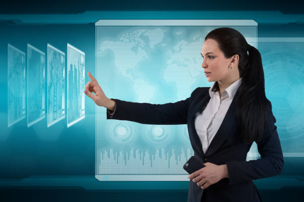 istock Beautiful business lady works with virtual graphic interface. Futuristic office 1213856812