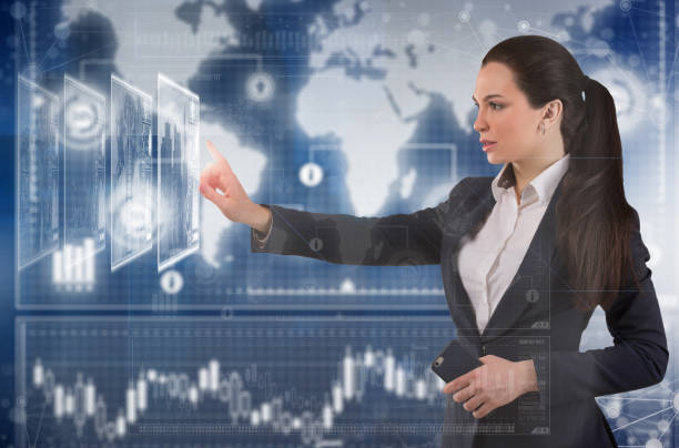 istock Young business lady works with virtual graphic interface in futuristic office 1213856948