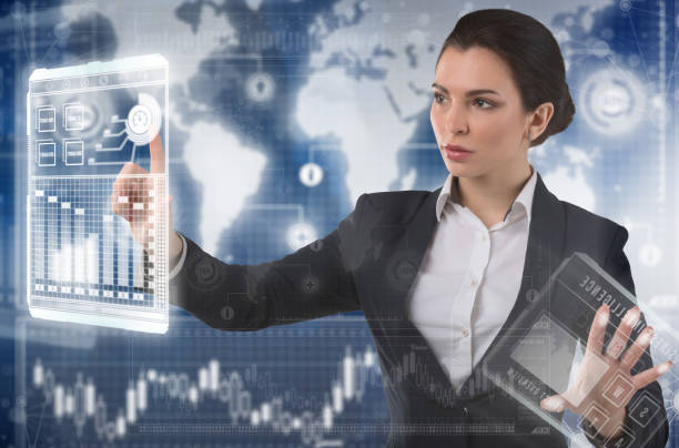 istock Young business lady works with virtual graphic interface in futuristic office 1213857007