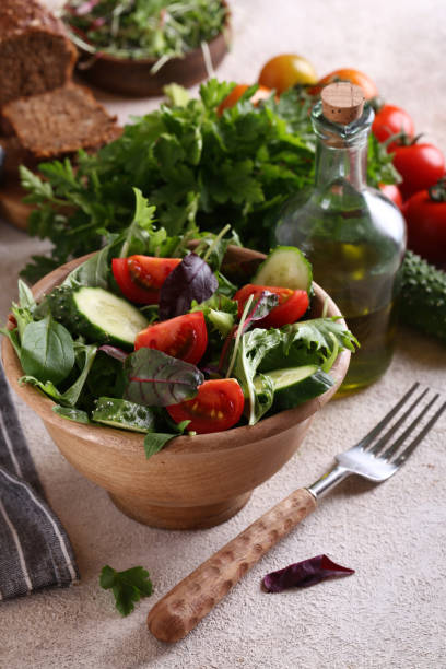 istock green salad mix with tomatoes 1213862887