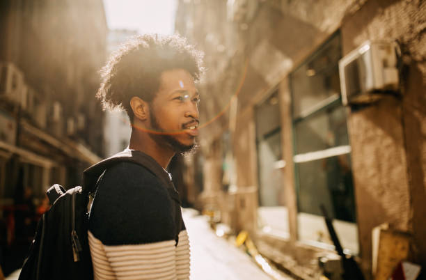 istock Young man ridding electric scooter 1213868863