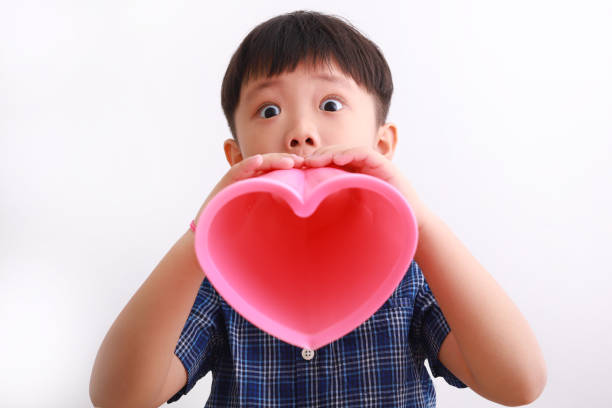 istock Boy with megaphone making an announcement 1213870019