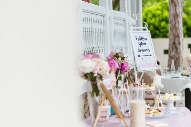 istock bouquet of flowers in vase on table party setting 1213871214