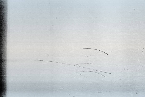 istock Noisy film frame with heavy scratches, dust and grain 1213871467