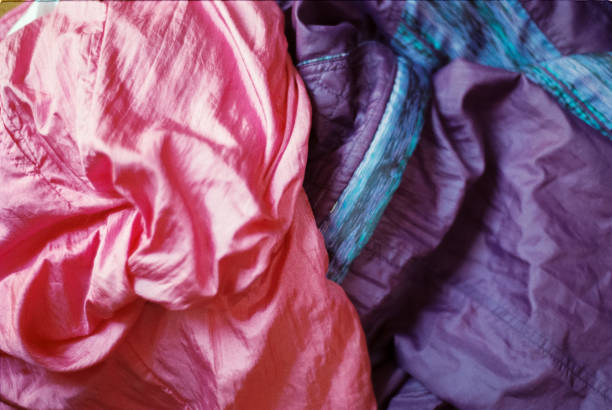 istock Pink and purple tactle fabric 1213873049