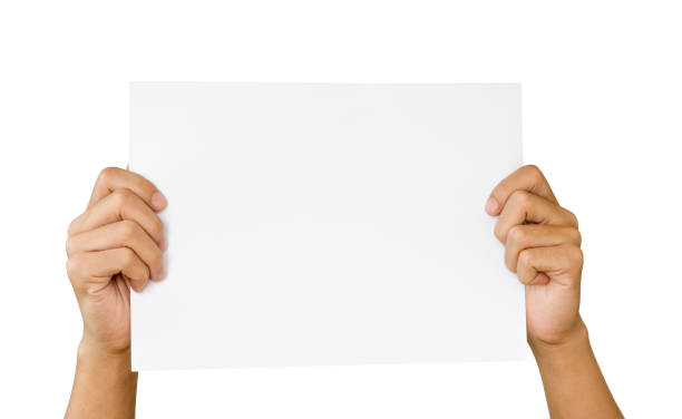 istock 2 Hands holding and rise up white paper for copy space and add text on white background. This photo is isolated and has clipping path. 1213875712